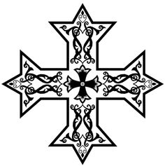 an ornate cross is shown in black and white