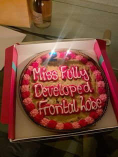 a birthday cake with the words miss fully developed from today written on it in pink frosting