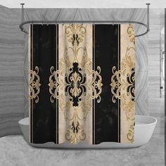 a black and gold shower curtain with an ornate design on the front, in a bathroom