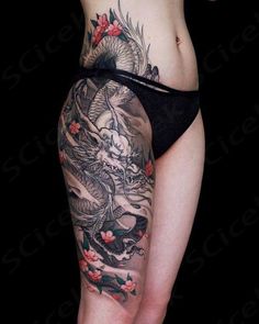 a woman with a dragon tattoo on her stomach and side view of the lower body