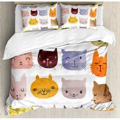 a bed with many different cats on it