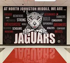 a large sign that says, at north houston middle we are jaguars