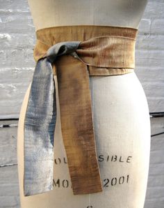 "This modern interpretation of an obi sash is made in reversible silk shantung. Shown in bronze reversing to pewter solid shantung. The sash provides an instant update to your wardrobe - add to a basic black dress or pair it with a tunic tee and jeans. It can be worn wrapped and tied in the front (as shown) or tied in the back. It's the ultimate must-have accessory! Widest part approx. 3 1/2\" Tie ends approx. 2 1/4\" Available in 3 lengths: 80\" long - fit up to a 32\" waist when wrapped & Obi Sash, Basic Black Dress, Vintage Slip Dress, Vintage Slips, Ball Gown Skirt, Prom Outfits, Suspender Belt, Clothes Horse, Sewing Clothes