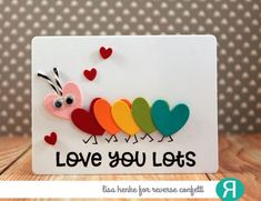 a card with the words love you lots on it and an image of a caterpillar