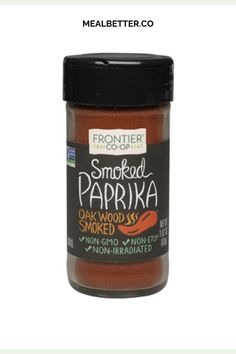 a jar of smoked paprika on a white background