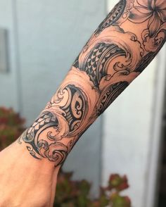 a person with a tattoo on their arm