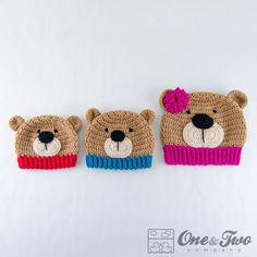 three crocheted teddy bears wearing hats