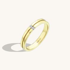 A clean-lined modern take on a wedding band. Two stones decorate this sturdy yet minimal band that will be just as wearable and loved in decades as it is today. Wear it alone or combine with your engagement ring. - Made in 14k solid gold- Decorated with handset White Cubic Zirconia stone on 14k solid gold- Band Width: 3.00 mm / 0.118 inches- Thickness: 1.50 mm / 0.059 inches- This product comes with iconic Norm Jewels gift box Wedding Band Rings, Wedding And Engagement Rings, Dainty Band, Solid Gold Band, Full Eternity Ring, Linking Rings, Wedding Band Ring, Eternity Wedding Band, Gold Decor