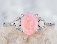 Pink Fire Opal Engagement Ring, Pink Opal Ring With Accent Stones As Gift, Elegant Oval Pink Opal Ring, Oval Pink Opal Ring For Wedding, Elegant Pink Opal Ring For Anniversary, Elegant Pink Opal Ring, Pink Opal Ring Fine Jewelry, Pink Opal Ring For Anniversary, Anniversary Pink Opal Oval Ring