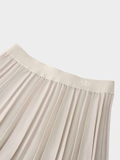 Our Merino Pleated Skirt-Ivory is the perfect addition to your wardrobe. Offering both comfort and style, it is a versatile piece that can easily be dressed up or down for any occasion. Elegant Cream Maxi Skirt With Relaxed Fit, Elegant Cream Lined Skirt Bottoms, Elegant Lined Cream Skirt, Elegant Cream Maxi Skirt, Elegant Beige Tiered Skirt Bottoms, Elegant Cream Lined Skirt, Elegant Beige Tiered Mini Skirt, Beige Pleated Tiered Maxi Skirt, Elegant Cream Mini Skirt For Spring