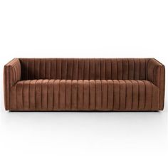 a brown velvet couch with pleated upholstered back and arms, viewed from the front