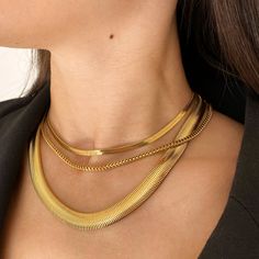 This necklace is a trendy addition to any look. The Dainty Flat Snake Necklace features a unique flat snake design. A delicate, wearable snake for your everyday look. Stack to make a statement. This necklace can be adjusted to be worn as either a choker or a longer necklace. Product DetailsMetal: 18K Gold Plated BrassLength: 36cmExtender: 9cmWidth: 0.4cmWeight: 7gLobster Clasp Fastening Snake Choker Necklace, Stacked Necklaces, Extraordinary Women, Snake Necklace, Gold Flats, Snake Design, Gold Choker Necklace, Gold Choker, Fashion Jewelry Necklaces