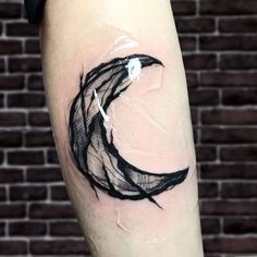 a black and white tattoo on the arm of a person with a clock in it