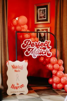 balloon arch with perfect match sticker on it