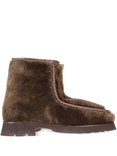 coffee brown calf leather shearling rear zip fastening round toe moc stitching rubber sole Winter Shearling Boots With Leather Sole, Brown Shearling Boots For Outdoor, Rugged Brown Shearling Boots, Brown High-top Shearling Boots, Shearling Lace-up Boots For Outdoor, Chanel 2, Boots Brown, Iconic Bags, Coffee Brown