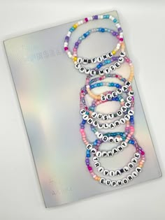 Love Yourself Answer BTS album beaded bracelet. Each bracelet features a song title from the album with color and design inspired by the album cover  Alternative versions of bracelets Serendipity, Singularity, Idol, Euphoria can be found in other listings.  Please keep in mind that colors may appear different due to individual screen settings. Handmade Multicolor Beaded Bracelets Kpop Style, Multicolor Round Beads Kpop Jewelry, Kpop Style Friendship Bracelets With Round Beads, Personalized Multicolor Kpop Style Bracelets, Kpop Style Personalized Multicolor Bracelets, Personalized Multicolor Kpop Style Jewelry, Kpop Style Personalized Multicolor Jewelry, Multicolor Kpop Jewelry For Friendship, Personalized Multicolor Beaded Bracelets Kpop Style