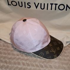 Authentic New Condition Wild At Heart Capsule Limited Edition Louis Vuitton Cap Is Embroidered With A Contrasting Monogram Pattern And The Iconic Monogram Canvas Adorns The Piping Around The Edge Of The Cap, As Well As The Adjustable Strap. Medium Size Pink Color 100% Silk Monogram Canvas Details Embroidered Allover Monogram Pattern Adjustable Strap At Back Dry Clean Only Size Medium 58eu, 22-25 Inch Made In Italy. Designer Visor Hats For Spring, Limited Edition Louis Vuitton, Louis Vuitton Hat, Monogram Hats, Louis Vuitton Limited Edition, Louis Vuitton Cap, Dior Book Tote, Monogram Pattern, Wild At Heart