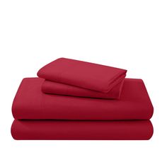 the red sheets are folded on top of each other