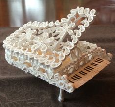 an intricately designed musical instrument sits on a table