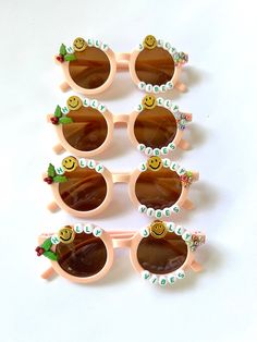 "CHRISTMAS SUNNIES!! These are so adorable-- Each pair is handcrafted by me. Using various beads, Charms, Rhinestones, and fun details!  \"HOLLY JOLLY VIBES\" * Anti-Glare * UV Protection (UVA & UVB) * Durable and shatterproof  * They open and close smoothly  * Each item is made to order and will be ready to ship in 5-7 business days! If you need your order sooner. Please check out my \"RUSH ORDER OPTION\".  https://www.etsy.com/EyeCandyandFluff/listing/1286351273/rush-my-order-please *SHOP DISCLAIMER/WAIVER!  * Do NOT let your child put the sunglasses in their mouth as beads can become detached.    Always monitor and supervise while children are wearing these. The shop assumes no responsibility for sunglasses made. Sizing--fits ages recommended 2-12 years.  If you need to make a large ord Cute Customizable Sunglasses For Gift, Playful White Sunglasses For Gift, Cute White Sunglasses For Gift, Playful White Sunglasses As Gift, Playful White Sunglasses For Gifts, Cute White Sunglasses As Gift, Cute White Sunglasses As A Gift, Pink Personalized Sunglasses For Gift, Personalized Pink Sunglasses As A Gift