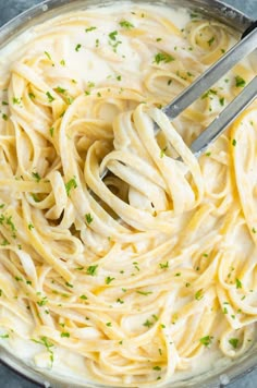 a pan filled with homemade olive garden alfredo sauce