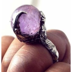 This One Of A Kind Ring Was Crafted From A Little Sphere Shaped #Amethyst #Crystalball #Gemstone That Gives Off Some Nice Facets And Inclusions Depending On The Lighting And Angle. The Stone Has Been Soldered With Lead Free, #Silver Bearing Solder To An Fixed Ring Base. This Ominous Beauty Definitely Looks Like What A Fantasy, Vampire Or Monster Lover Would Wear. Love The Gothic Detail And Clarity Of The #Crystal . Amazing Design And Stone. Goes With With Any Outfit Or As A One Of A Kind Gift. Adjustable Size 6-12 Can Be Made Into A Fixed Size Upon Request. Please Contact Me With Any Questions. Vampire Rings, Fantasy Vampire, Monster Lover, Crystal Ball Ring, The Gothic, Amethyst Ring, Amethyst Crystal, Crystal Ball, Womens Jewelry Rings