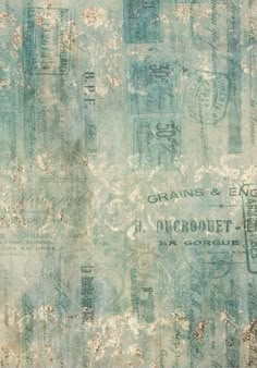 an old, grungy wallpaper with stamps on it