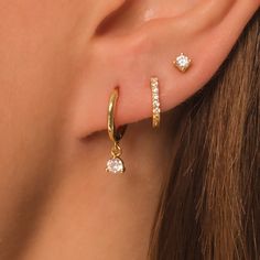 Dainty Everyday Earring Gift Set DETAILS: * Sterling Silver & 18K Gold Vermeil (strong plating over sterling silver) * A (hoop) - inner diameter - 9mm, length - 18mm * B (pave hoop) - inner diameter - 7mm * C (stud) - 3mm with butterfly backings * Nickel and lead free * Waterproof  * Tarnish resistant  * Hypoallergenic  * Lightweight * Can be worn 24/7 Each design sold as a pair (2 earrings) All earrings: https://www.etsy.com/shop/KaterynasJewelry?search_query=earrings Earring Sets For 2 Piercings, Earring Ear Ideas, Ear With 3 Piercings, Earring Stack Sets, 3 Hoops Earrings, 3 Rd Piercing, 4 Earrings In One Ear, Solid Gold Earring Stack, Three Ear Piercings Aesthetic