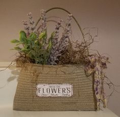 there is a basket with flowers in it