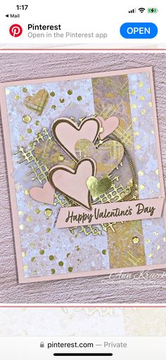 a card with two hearts and the words happy valentine's day on it