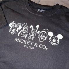 Mickey & Co T Shirt Size: Small Medium Large Extra Large Color: Black Brand New Custom Made Unisex T Shirt Suitable For Men And Women Product 100% Cotton Material This Is A Perfect Gift For Your Friends Or Family Or For Yourself! If Buy More Than 2 Items I Send You A Special Offer. Don’t Forget To Use My Referral Code: Cindiisfashion To Receive $ 10 Off Your First Purchase! Junior Shirts, Tie Front Cardigan, Crochet Shirt, Red Shorts, Black White Fashion, Red Sweaters, Dress Details, Cotton Material, Christmas Shirts