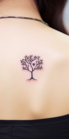 A minimalistic tattoo of a tree with a small heart at its center, symbolizing our deep love and bond with nature. Nurturer Tattoo, Mother Daughter Tattoos Tree Of Life, Three Circle Tattoo, Small Cosmo Flower Tattoo, Lightning Chest Tattoo Female, Grounding Tree Tattoo, Pretty Tree Tattoo, Owl And Tree Tattoo