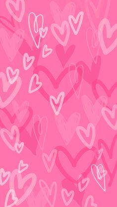 many hearts are drawn on a pink background