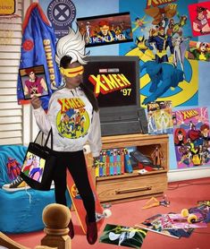 a man holding a skateboard standing in front of a tv with cartoon characters on it