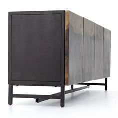 the sideboard is made out of metal and wood, with a black finish on top