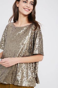 Gorgeous, timeless piece perfect for day or night, dressed up or down. Sequins are NOT just for Christmas, think teamed with distressed denim or leather look for a stylish effortless look you'll love! Available in stunning BRONZE, BLUSH and BLACK. Sequin, boxier style, looser fit, short sleeves and round neck. 100% POLYESTER BRONZE - PRE-ORDER - SHIPS 10/19 Glamorous Embellished Top For Date Night, Embellished Glamorous Top For Date Night, Embellished Tops For Date Night And Party Season, Chic Shimmer Top For Fall, Chic Shimmer Tops For Fall, Glamorous Embellished Tops For Fall, Glamorous Evening Tops For Fall, Glamorous Short Sleeve Blouse, Chic Embellished Fall Tops