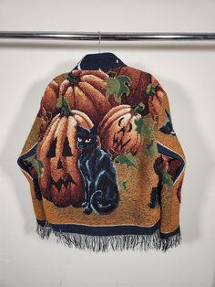 1/1 Upcycled Work-Style Blanket Jacket  Size: M Description: Work style button-up jacket made from repurposed blanket, depicting black cats among a field of pumpkins and jack-o-lanterns with moons and stars above Retro Embroidered Fall Outerwear, Hippie Embroidered Fall Outerwear, Vintage Embroidered Outerwear For Festivals, Garfield Jacket, Red Embroidered Folk Outerwear, Halloween Jacket, Embroidered Halloween, Blanket Jacket, Cat Work