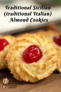 traditional sicilian traditional italian almond cookie with cherries in the center and on top is an image of two cookies