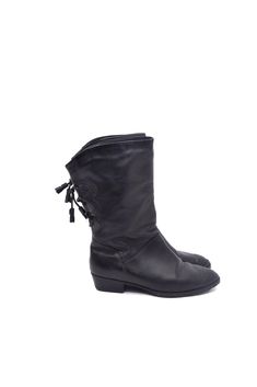 Embrace the bold style of the 80s with these stunning black leather boots! Featuring stylish back laces with tassel details, a sturdy heel, and cozy warm lining, these boots are both fashionable and functional. Perfect for adding a vintage edge to your look while staying comfortable in colder weather. In excellent condition, these boots are ready to make a statement in your wardrobe! - Label: n/a  - Era: 1990s - Color: black - Fabric: real leather, suede  - Condition:very good. ready to wear. - Size: 38 EU / 7.5 US / 5 UK  - Fits: 37 EU/ 6.5 US, 4 UK MEASUREMENTS: Sole: 9.4" (23.8 cm) Heel: 1.3" (3 cm) Shaft: 10" (25 cm) Black Leather Heel Boots, Leather Heel Boots, Leather Heeled Boots, Bold Style, Black Leather Heels, Heel Boots, The 80s, Black Leather Boots, Bold Fashion