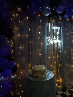 a birthday cake sitting on top of a table