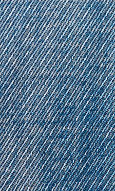 a close up view of the blue and white fabric