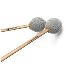 two wooden mallets sitting next to each other