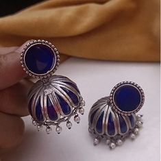 Navy Blue Jhumka/ Blue Meenakari Jhumka/ Oxidized Silver Jhumka Earrings/Blue Tribal Jhumka/ Designer Earrings/ Indian Ethnic Earrings Description: - Length: 2 Inches - Earring come with Push back Closure - Lightweight Meenakari Jhumka Earrings - Contemporary earrings in silver finish. - Very Elegant and stylish, these earrings can be paired with any traditional Indian or Western Attire depending upon the occasion and the theme. - The base is pure brass which makes this very sturdy and of good q Cheap Bohemian Jhumkas For Diwali, Traditional Handmade Blue Danglers, Blue Handmade Danglers For Festive Occasions, Blue Bohemian Jhumkas For Festive Occasions, Festive Blue Tilla Jhumkas, Festive Blue Bohemian Jhumkas, Festive Bohemian Blue Jhumkas, Blue Jhumkas For Festivals And Celebrations, Blue Latkans Danglers Gift