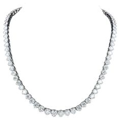 This stunning and impressive Riviera Necklace features substantial Diamond weight of 18 Carats in beautifully graduated Round Brilliant Cut gems with a sparkly excellent cut white color G clarity VS/SI1. Each stone has a three claw setting with open gallery and set in 18 Karat White Gold. The necklace has been entirely made in Italy at Valenza Po known to produce the best jewels in the market. Consider that for this quality and handmandcraft this jewel will cost much more in the market. Riviera Necklace, Fine Jewels, Link Necklace, Round Brilliant, Diamond Necklace, Choker Necklace, In Italy, Jewelry Necklaces, Gems