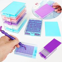 a person is holding a purple pen in front of several different types of binders