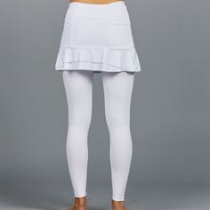 Designer Activewear.Designed and made in Miami.DESCRIPTIONUV Leggings - light solid white legging (SPF 40+ inherent in this finely knit fabric). Intended to be worn underneath any sort of choice.DETAILS & FITAthletic fit, tapered to the body.FABRIC & CARE88% Nylon / 12% SpandexSPF 40+ inherent in fabricMachine wash cold, do not bleach, tumble dry low, cool iron, do not dry clean. White Sports Leggings With 4-way Stretch, White 4-way Stretch Sports Leggings, White 4-way Stretch Yoga Pants, White Elastane Activewear For Pilates, High Stretch White Pants For Spring, White 4-way Stretch Sporty Leggings, White 4-way Stretch Leggings For Pilates, White Sporty 4-way Stretch Leggings, White Sporty Leggings With 4-way Stretch