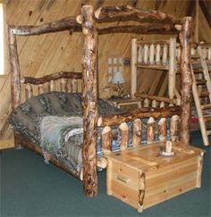 a bed made out of logs in a room