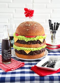 a large hamburger sitting on top of a table