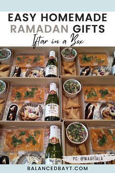 several boxes filled with different types of food and wine bottles on top of each box