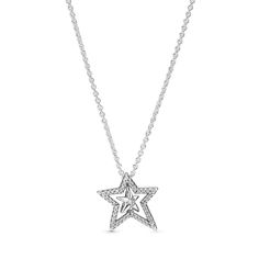 Create starry style with the Pavé Asymmetric Star Collier Necklace. Hand-finished in sterling silver and featuring sparkling clear cubic zirconia, this is a subtle design and delicate form with unique detailing. The necklace features an asymmetric sparkling star pendant with a spinning mini star in the center and a cubic zirconia set in the center. Inspired by the glittering stars, this celestial-themed necklace is perfect for anyone who wants to add the magic of the night sky to their look. Luxury Silver Diamond Necklace With Star Shape, Fine Jewelry Silver Star Necklace, Pandora Star Necklace, Cheap Silver Star Necklace, Sterling Silver Star-shaped Diamond Necklace, Pandora Pave, Pandora Silver, Sparkling Stars, Quartz Crystal Necklace